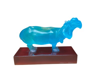 Lot 2208 - French Daum glass model of a hippopotamus, of blue colour on a red plinth base, in original box, 18.5cm across x 13.5cm high