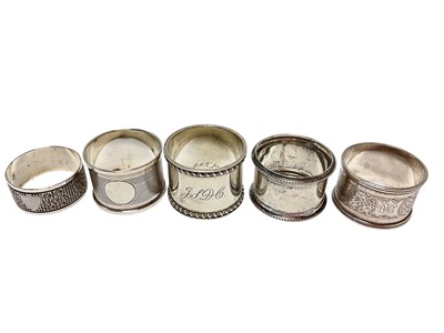 Lot 396 - Five silver napkins rings