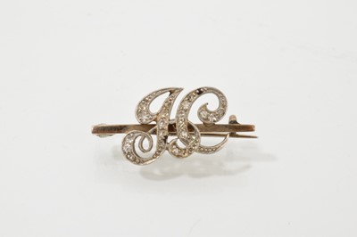 Lot 710 - Diamond brooch in the form of initials JC.