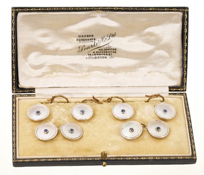 Lot 707 - Suite of gold and enamel cufflinks and dress studs, in box retailed by Searle & Co.