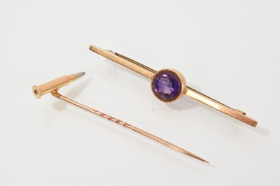 Lot 709 - 15ct gold tie pin and an unusual gold bullet pin