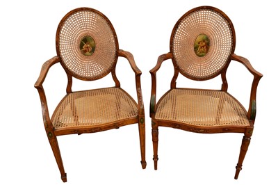 Lot 1407 - Near pair of Edwardian satinwood and polychrome painted elbow chairs