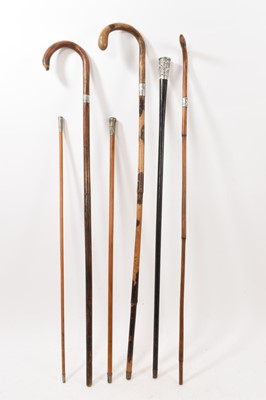 Lot 932 - Group of antique walking sticks