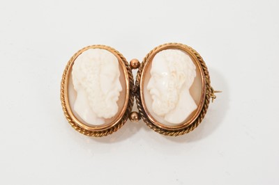 Lot 683 - Victorian yellow metal mounted twin cameo brooch decorated with classical male heads