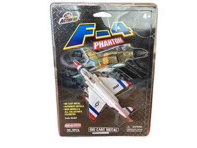 Lot 1711 - Realtoy Wings 1:144 scale diecast aircraft including F-4 Phantom (4 versions) ~ 38976, F-15 Eagle (2 versions) ~ 38977, F-18 Hornet (2 versions) ~ 38978, F-117 Nighthawk ~ 38979, Sukhoi 34 ~ 389...