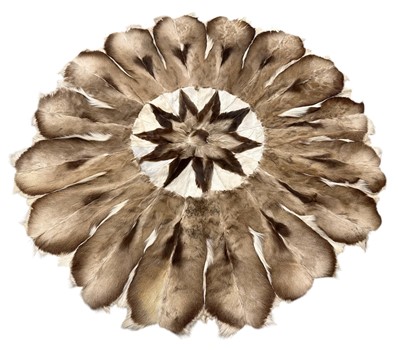 Lot 925 - South African skin rug or circular form with central medallion, 174cm diameter