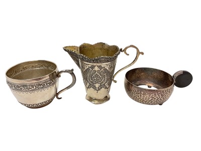 Lot 404 - White metal teacup and Middle Eastern cream jug