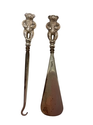Lot 406 - Silver teddy bear shoehorn and button hook