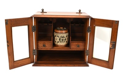 Lot 944 - Late 19th century oak smokers' cabinet with historic detail
