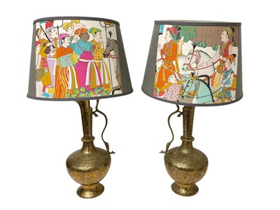 Lot 1014 - Pair of Anglo Indian brass ewers, lamps with decorative shades