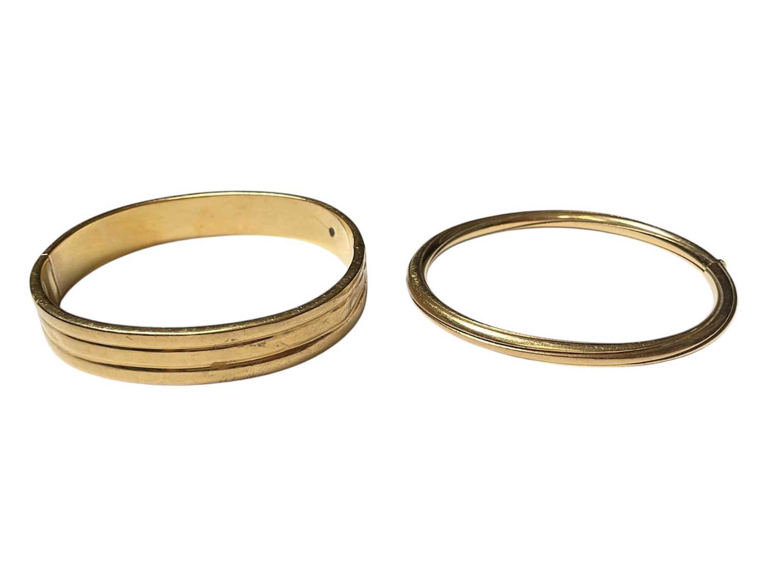 Lot 38 - Two 18ct gold bangles