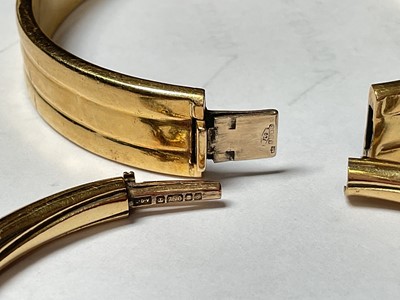 Lot 38 - Two 18ct gold bangles