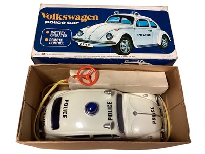 Lot 1801 - Battery operated Volkswagen Police Car with control line, boxed, MB Super Simon computer games consul, Top Trump & Star Trek cards (1 box)
