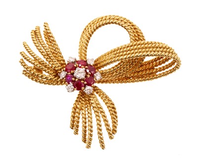Lot 613 - Gold diamond and ruby bow brooch
