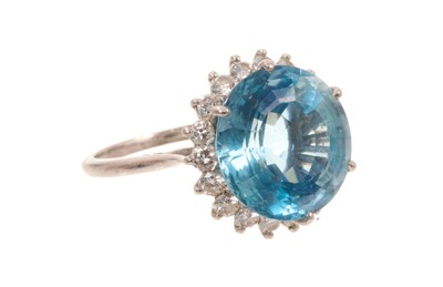 Lot 618 - Cartier aquamarine and diamond cluster ring in box