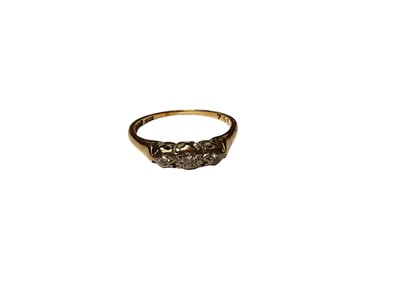 Lot 42 - Diamond three stone ring in illusion setting on 18ct gold shank, size M