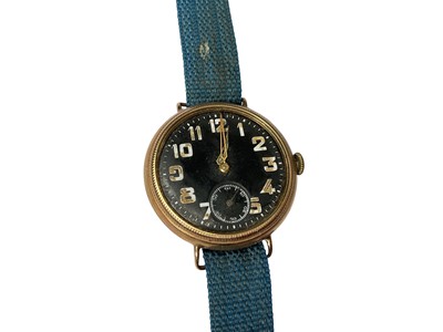 Lot 79 - 1920s 9ct gold cased wristwatch with a Zenith movement, circular black dial, Arabic numerals and subsidiary seconds in gold case