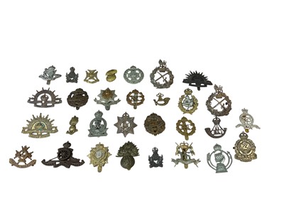 Lot 765 - Collection of approximately thirty British Military cap badges to include Royal Artillery and Tank Corps, (30).