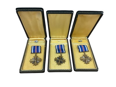 Lot 775 - Three American Distinguished Flying Cross medals in 'coffin boxes', (3).
