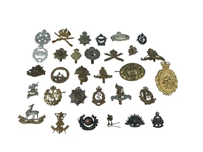Lot 782 - Collection of approximately thirty British Military cap badges to include Royal Artillery and Army Service Corps, (30).