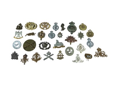 Lot 784 - Collection of approximately thirty British Military cap badges to include Royal Military Police and Royal Marines, (30).