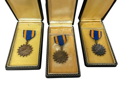 Lot 791 - Three Air medals in 'coffin boxes', (3).