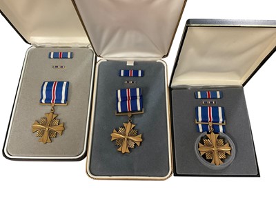 Lot 792 - Three American Distinguished Flying Cross medals in boxes, (3).