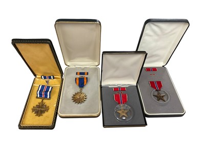 Lot 793 - Group of four American medals in boxes to include two Bronze Stars, Distinguished Flying Cross and an Air Medal, (4)