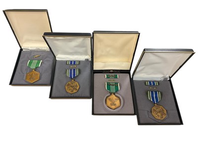 Lot 795 - Group of four American medals in boxes to include two Army Achievement medals and two Army Commendation medals (4)