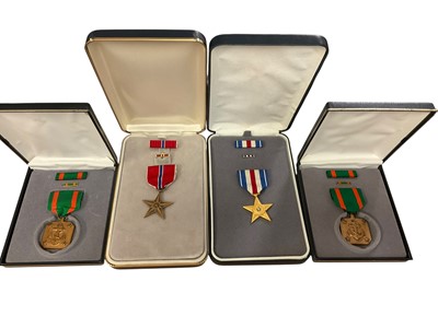 Lot 796 - Group of four American medals in boxes to include two Navy and Marine Corps Achievement medals, a Bronze Star medal and a Silver Star medal (4)