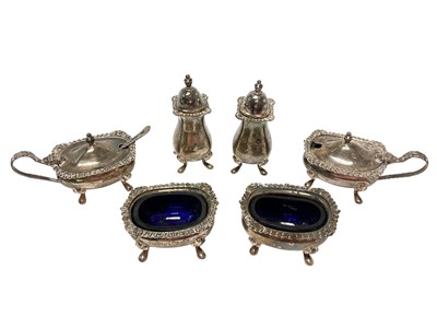 Lot 385 - Two Georgian style silver three piece condiment sets