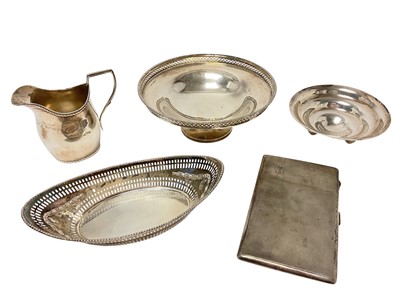 Lot 387 - Group of silver items to include a cigarette case, cream jug, and two bon bon dishes