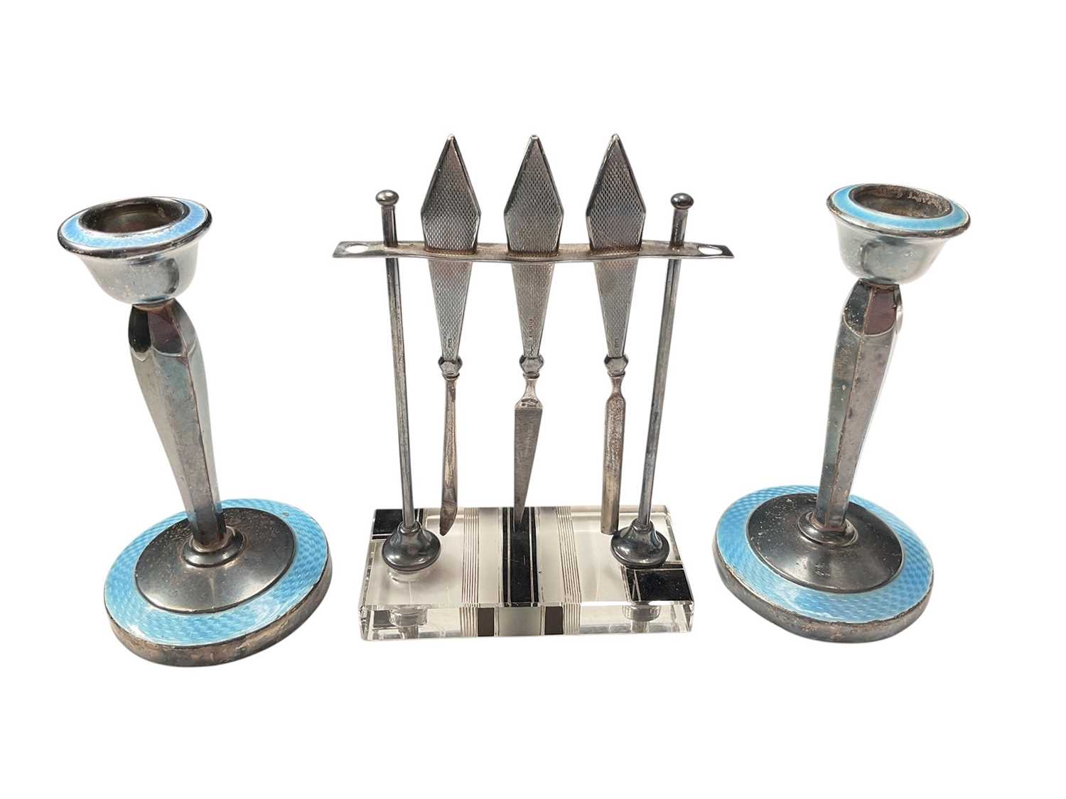 Lot 73 - Pair of 1930s silver and blue guilloché enamel candlesticks (Birmingham 1937), 13cm high, together with a 1930s silver mounted manicure set