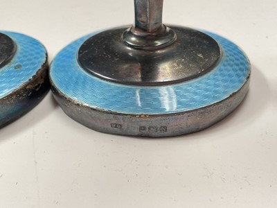 Lot 73 - Pair of 1930s silver and blue guilloché enamel candlesticks (Birmingham 1937), 13cm high, together with a 1930s silver mounted manicure set