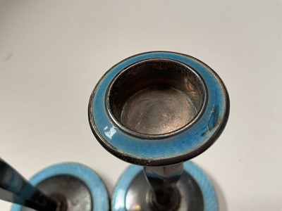 Lot 73 - Pair of 1930s silver and blue guilloché enamel candlesticks (Birmingham 1937), 13cm high, together with a 1930s silver mounted manicure set