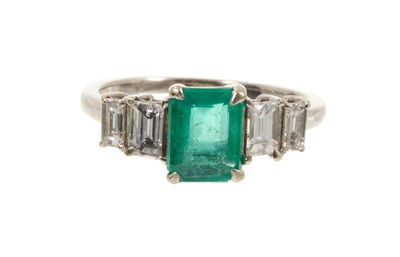 Lot 689 - Art Deco style emerald and diamond ring with a rectangular step cut emerald