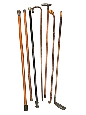 Lot 208 - Collection of canes and walking sticks including a Chinese silver topped cane, novelty whistle stick and others