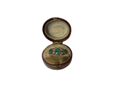 Lot 126 - Antique 9ct gold green glass and seed pearl ring in an open work setting, size M, in an antique box