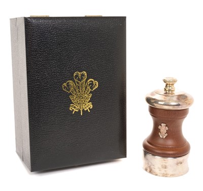 Lot 62 - H.R.H. Prince Charles Prince of Wales, Royal Christmas gift pepper grinder with silver plated mounts, turned wood body with silver Prince of Wales feather crest in original fitted box with gilt e...