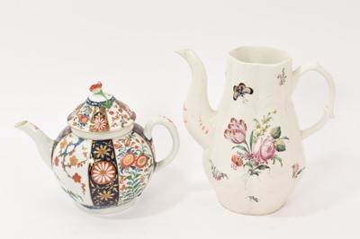 Lot 211 - Longton Hall porcelain coffee pot, circa 1755, of moulded baluster form, painted in colours with floral sprays, 21cm high, together with a Worcester Queen's pattern teapot, circa 1770 (2)