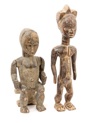 Lot 975 - Two carved African figures