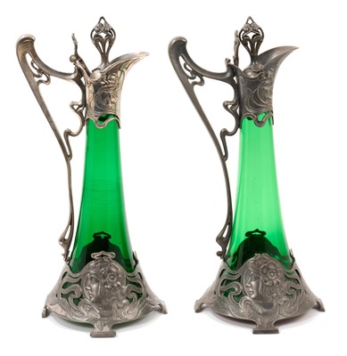 Lot 916 - Near pair of Art Nouveau WMF green glass decanters