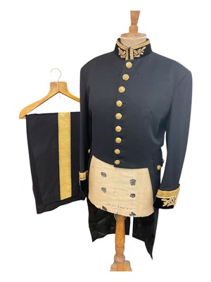 Lot 5 - H.M. Queen Elizabeth II British Diplomats' court uniform comprising tailcoat with gold bullion work decoration and gilt brass Royal Coat of Arms buttons, trousers with broad gold bullion strip,...