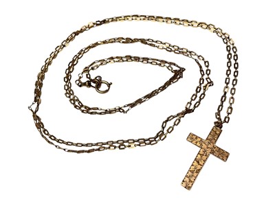 Lot 21 - Victorian 9ct gold long guard chain with a 9ct gold cross pendant