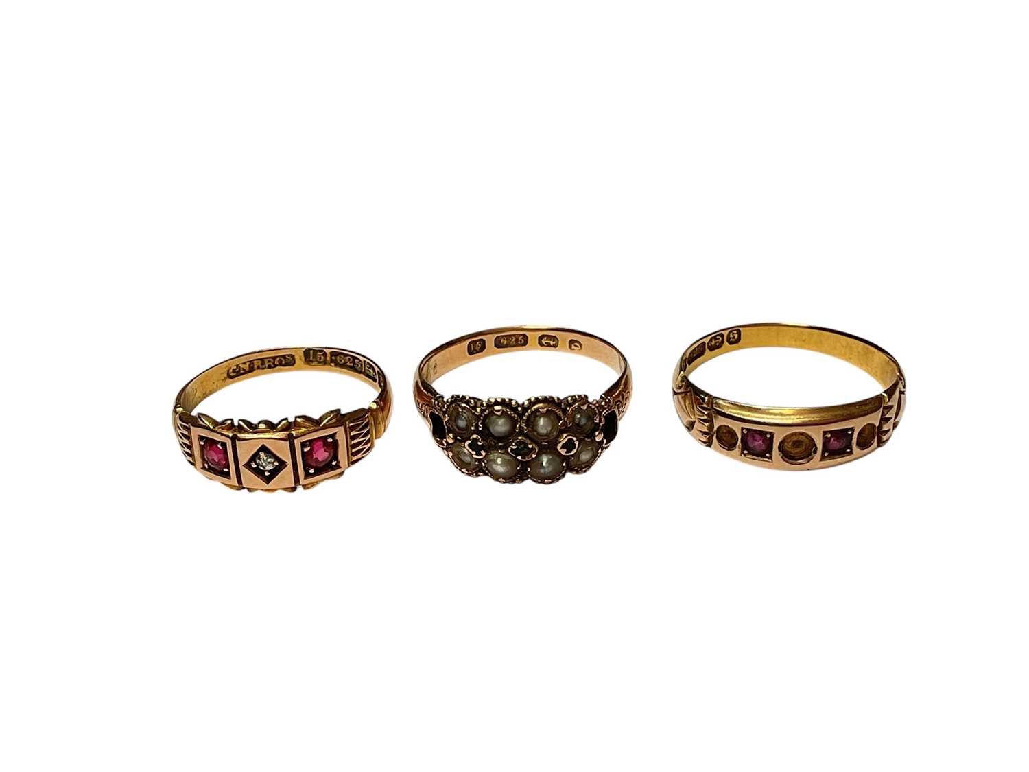 Lot 26 - Three Victorian 15ct gold seed pearl and gem set rings