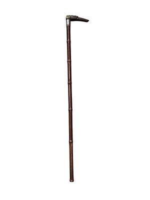 Lot 2936 - Victorian carved horn dog’s head walking stick with silver mount