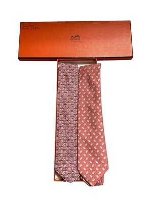 Lot 2552 - Two Hermès silk ties, pink saddle 7173 FA and 7110 OA, pink zebra, in one box