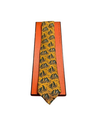 Lot 2507 - Hermès silk tie, gold with green penguin 7334 EA boxed