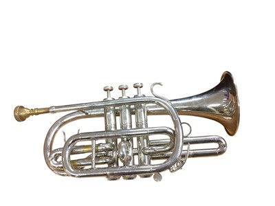 Lot 2708 - Old silvered cornet with mouthpiece, in case
