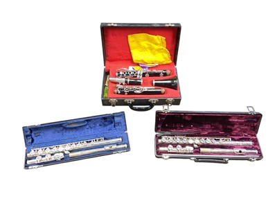 Lot 2709 - Collection of instruments and stands, including two flutes, clarinet etc